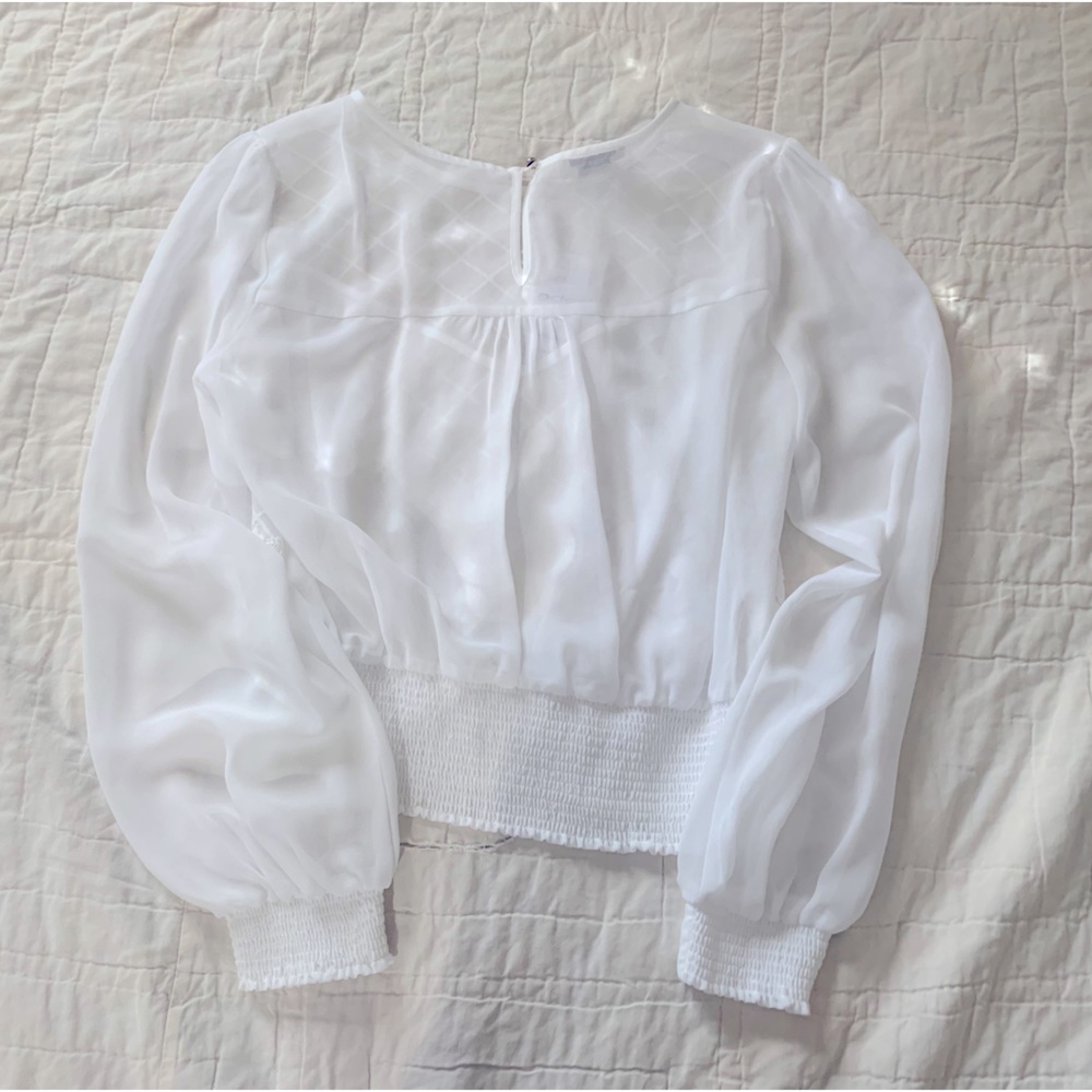 Bebe sheer white blouse